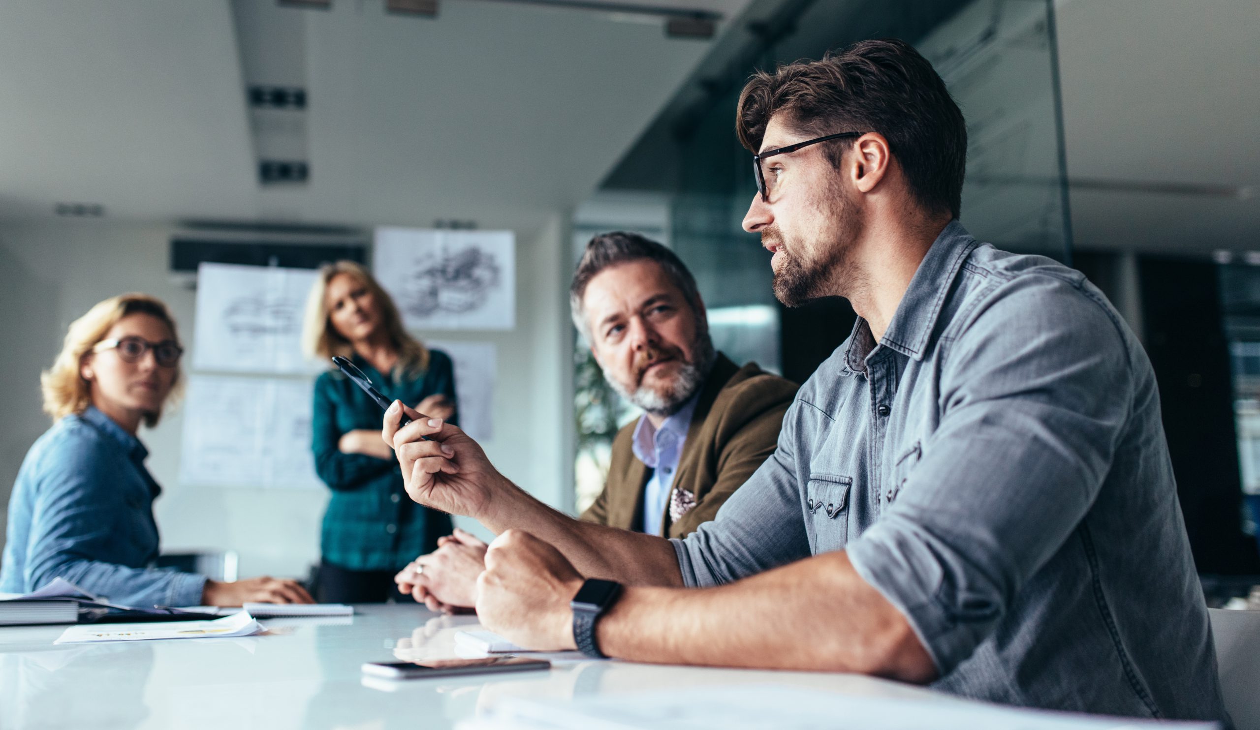 Sales and revenue leaders in strategic discussion
